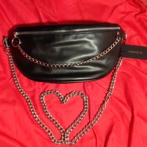 Sexy, edgy faux leather handbag